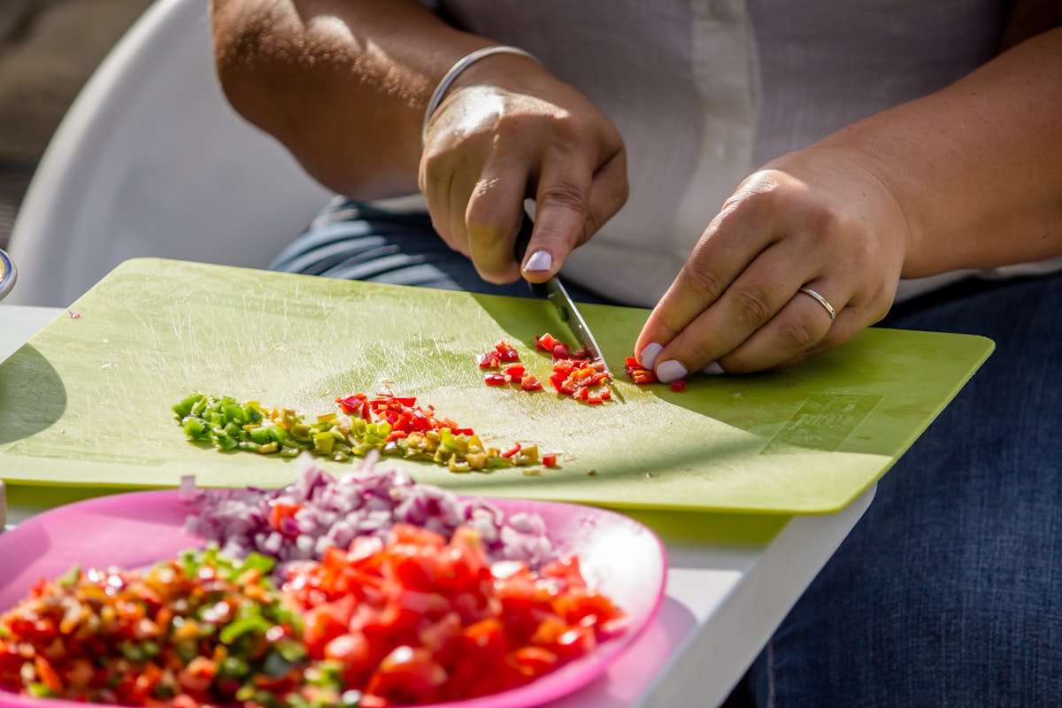 Professional chef demonstrating knife techniques
